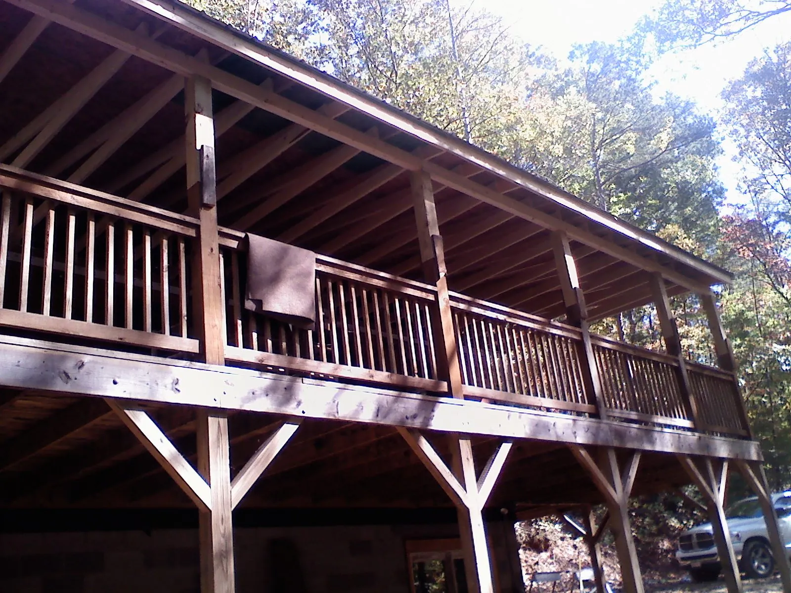 Timber framing under a new elevated porch and deck — Roof Leak Repair in Altamahaw by Roofing Brothers